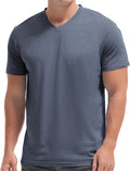 A man wearing a premium fitted modern V-neck t-shirt in a neutral color, showcasing the form-fitting cut.