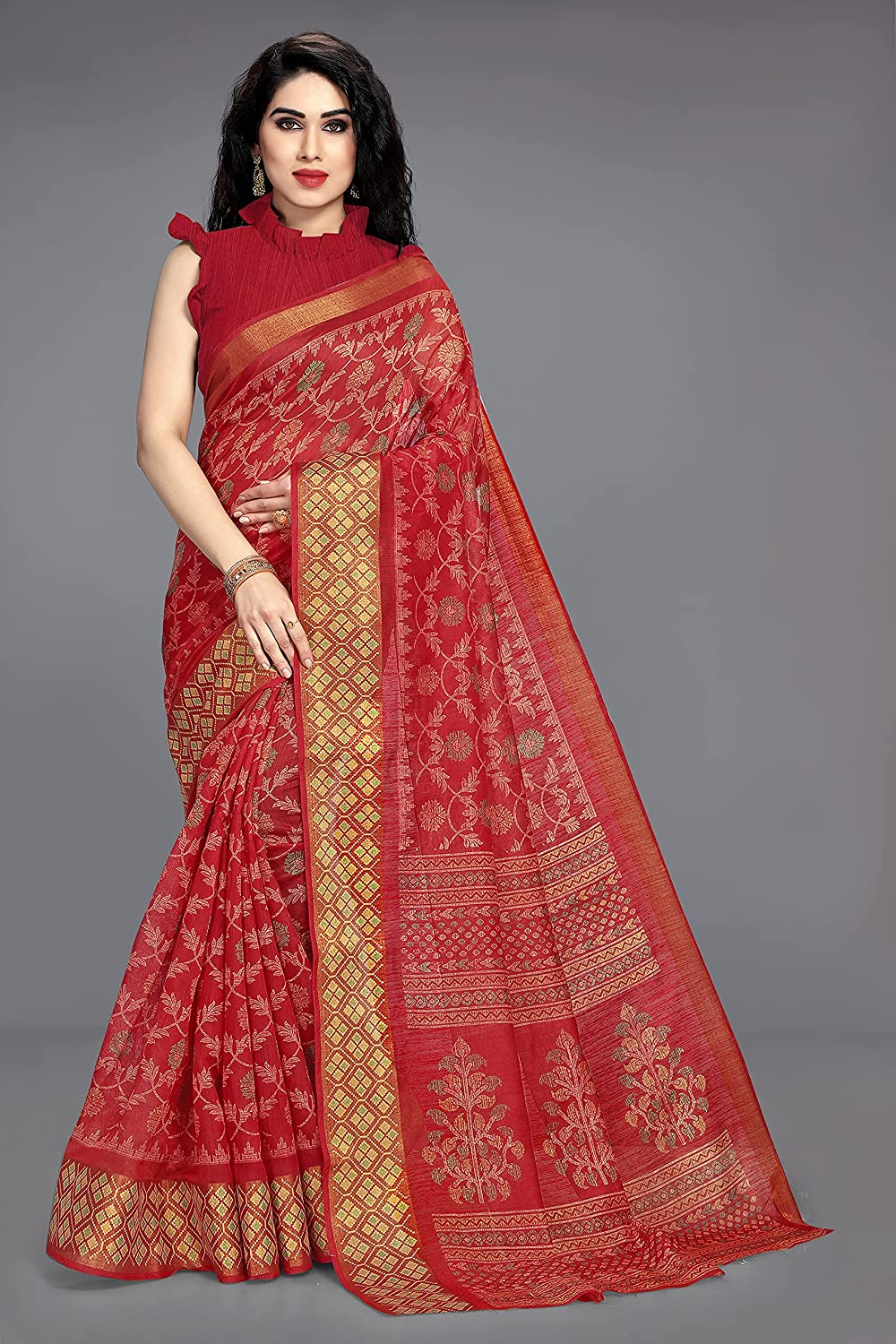 Woman wearing a Red and Yellow Kalamkari printed cotton blend saree with contrast border