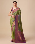 Olive green Banarasi silk saree with detailed zari and brocade patterns.