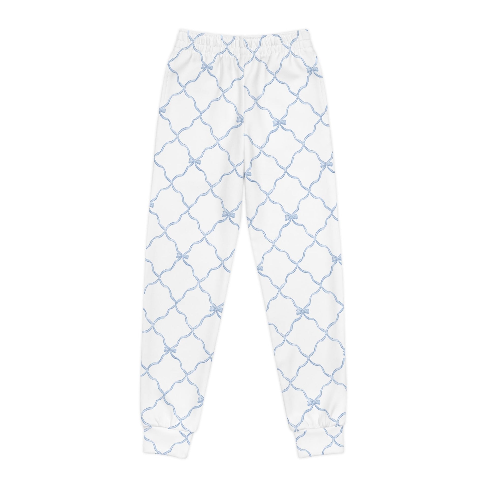 Youth joggers in white featuring a blue trellis bow pattern, with side pockets and elastic ankle cuffs.