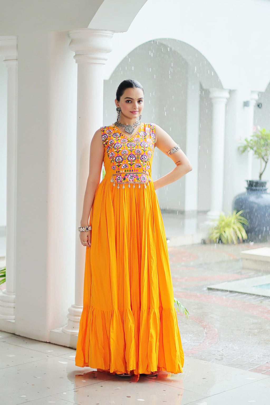 Yellow Rayon gown with intricate Kutchi Gamthi embroidery and mirror work for Navratri