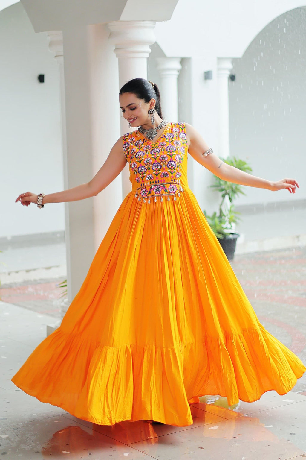 Yellow Rayon Gown with Kutchi Gamthi Embroidery and Mirror Work