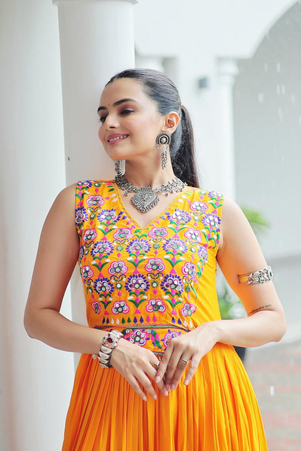 Yellow Rayon Gown with Kutchi Gamthi Embroidery and Mirror Work
