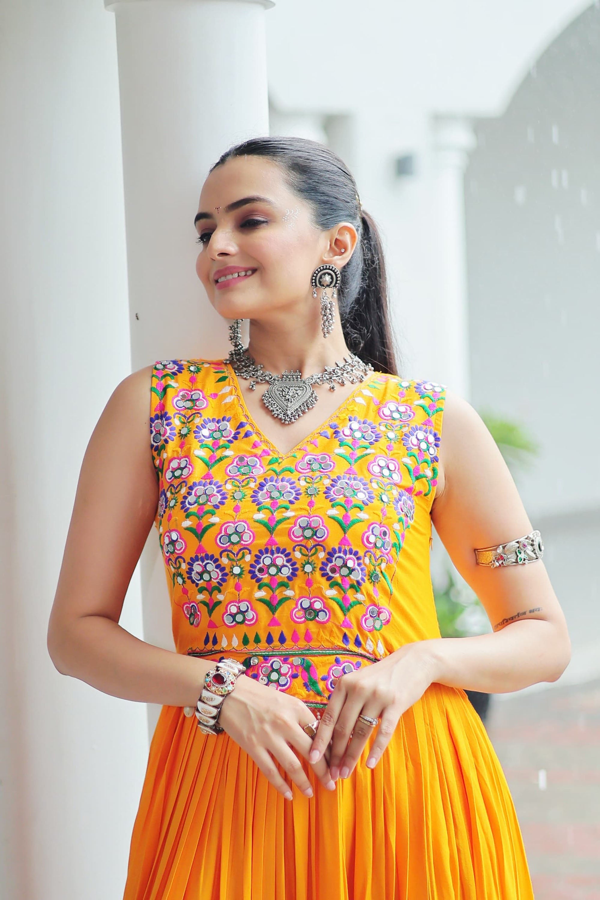 Yellow Rayon Gown with Kutchi Gamthi Embroidery and Mirror Work