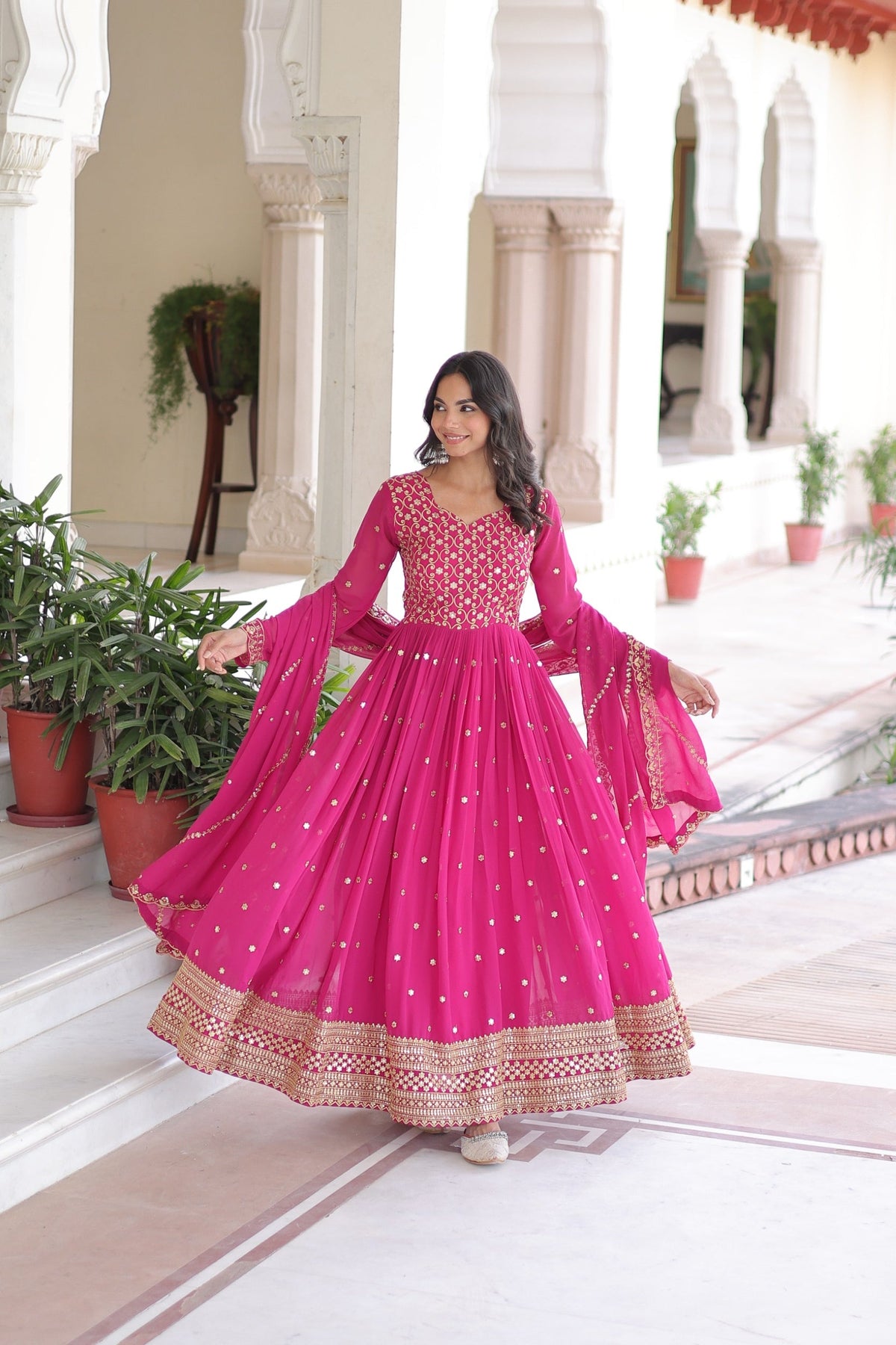 Pink Faux Georgette Anarkali Gown with Rich Sequins & Zari Work