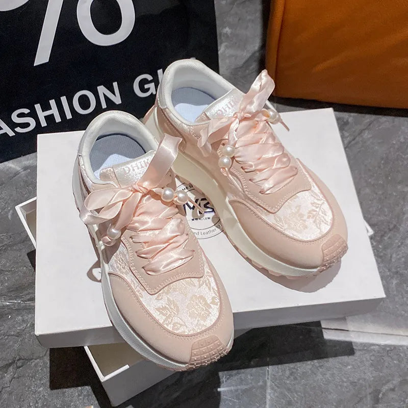 Women's floral platform athletic sneakers with lace-up closure