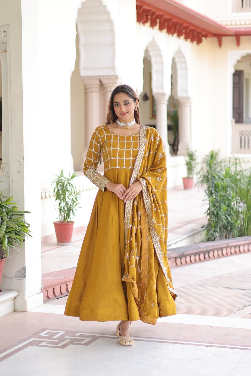 Mustard Vichitra Silk Anarkali Gown with rich gold zari and sequin embroidery