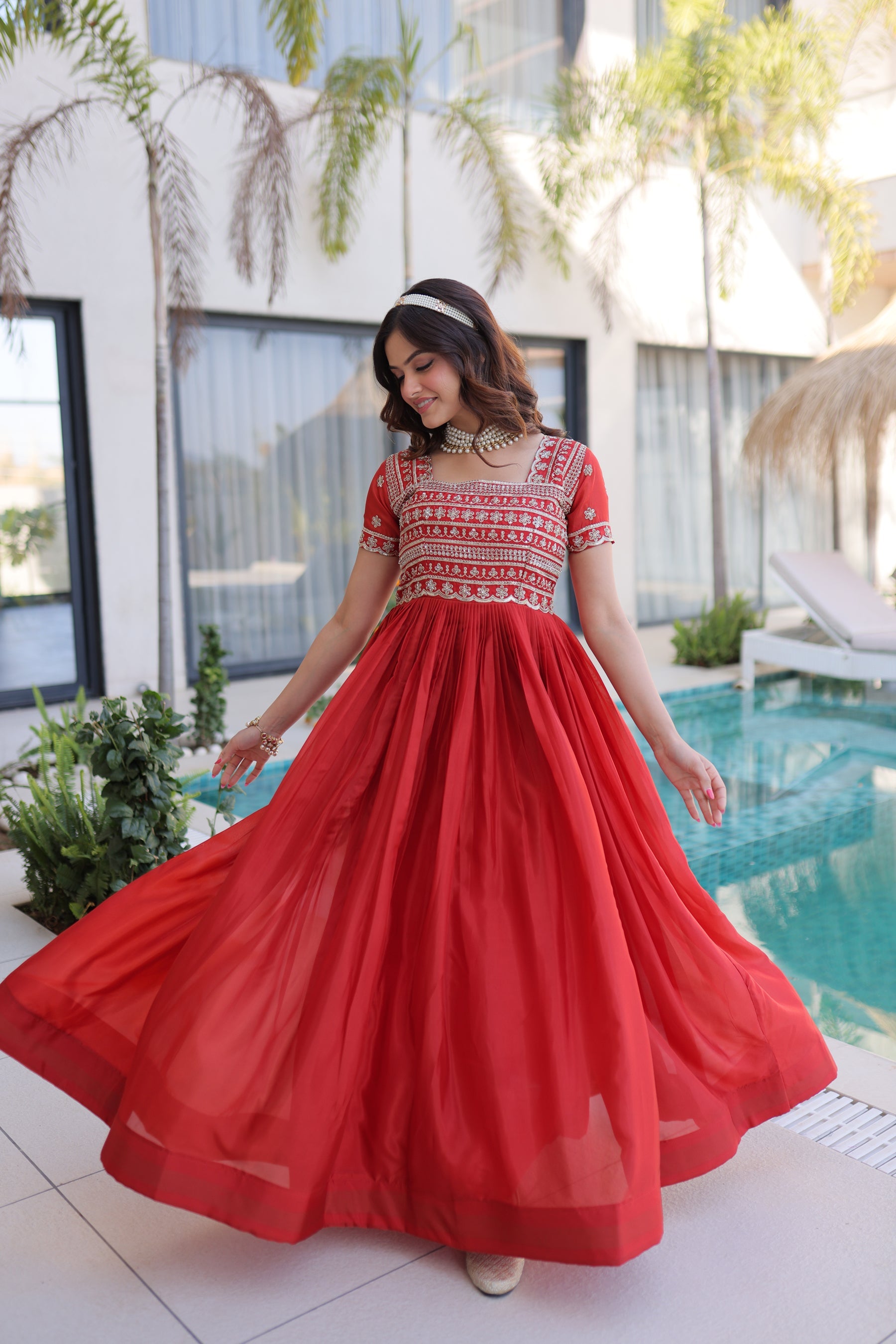Elegant Fenta-colored H O Silk gown with sequins, Zari, and pipe bead embroidery details.