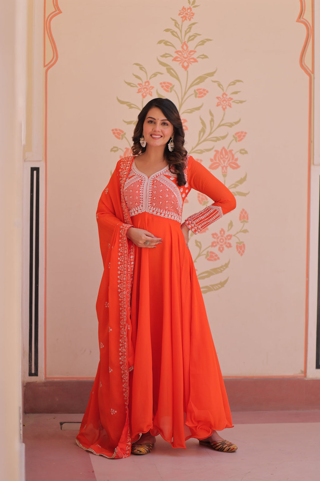 Orange star georgette gown with sequins and bead embroidery and matching dupatta