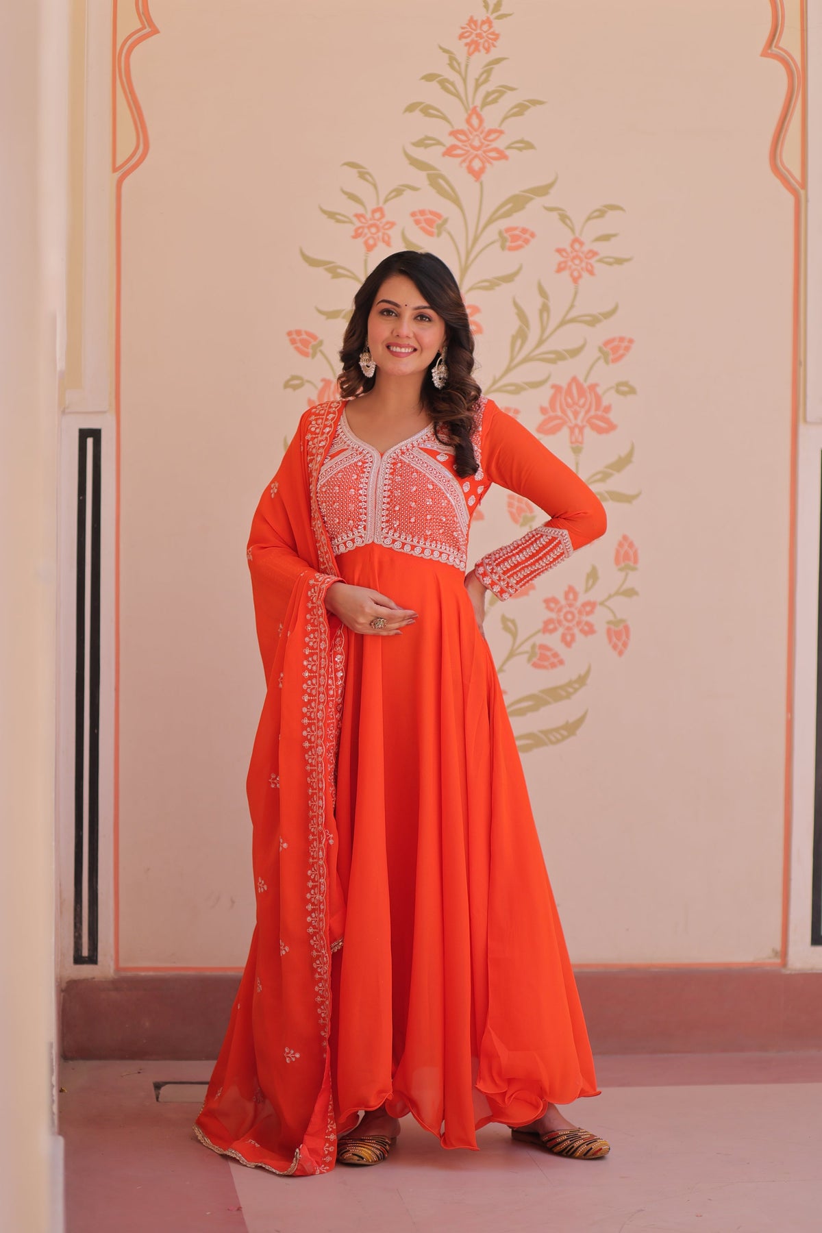 Orange star georgette gown with sequins and bead embroidery and matching dupatta