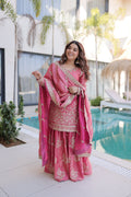 Pink Fendy Satin Crush kurta paired with embroidered sharara and dupatta for women