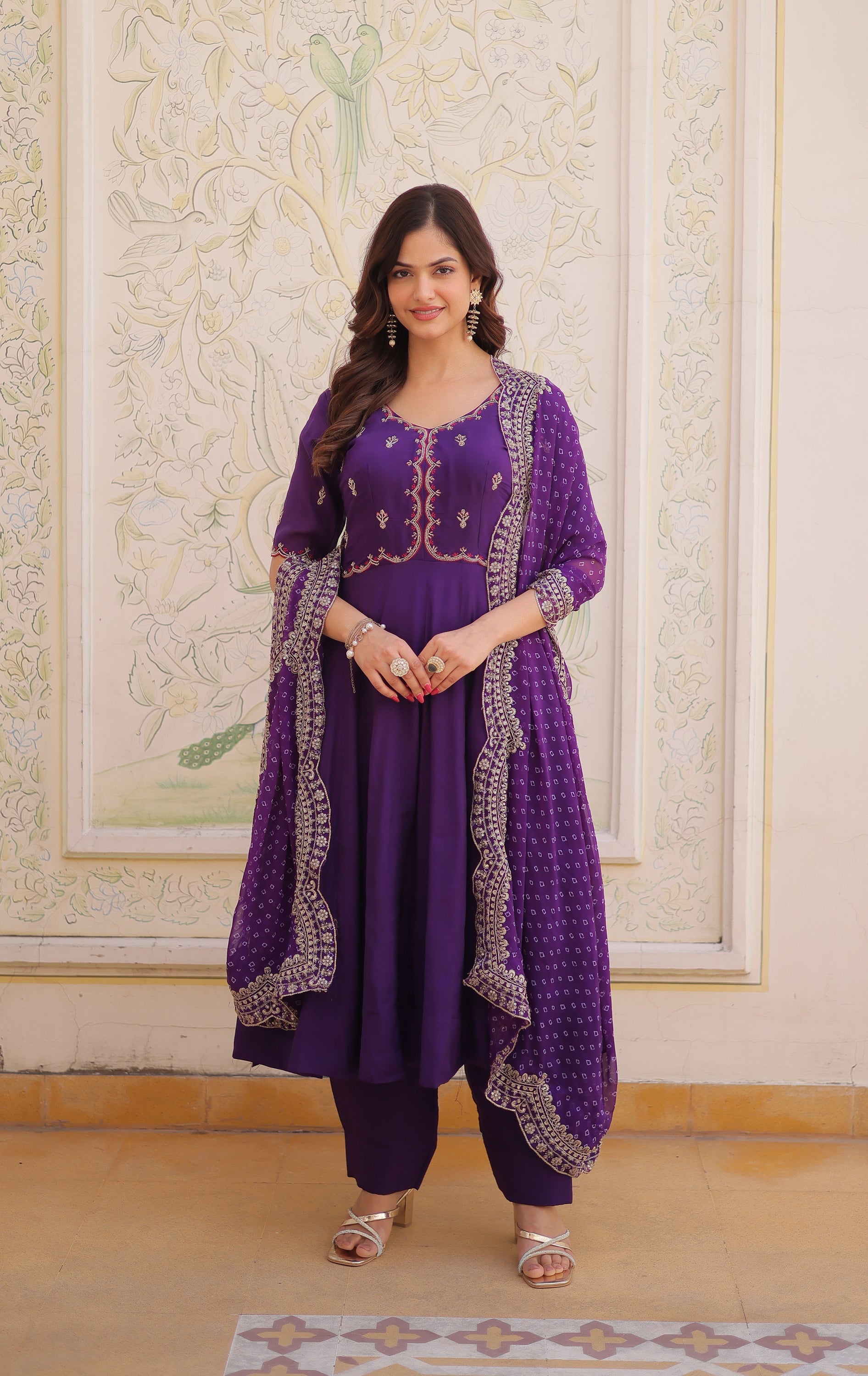 Elegant purple Mul Chanderi kurta set with bead and thread embroidery and matching dupatta.