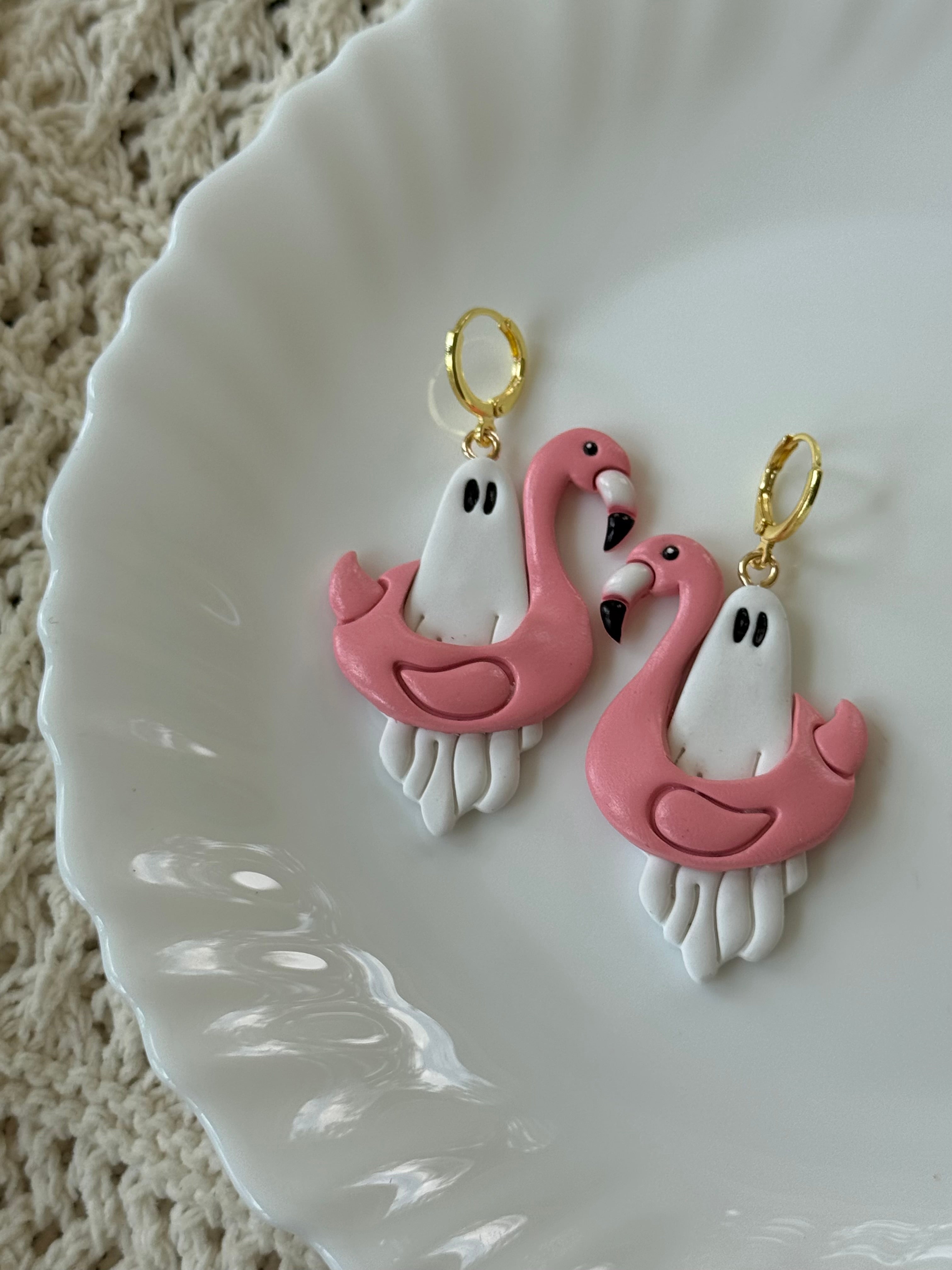Flaminghost Huggies in pink and white polymer clay with gold-plated hardware.