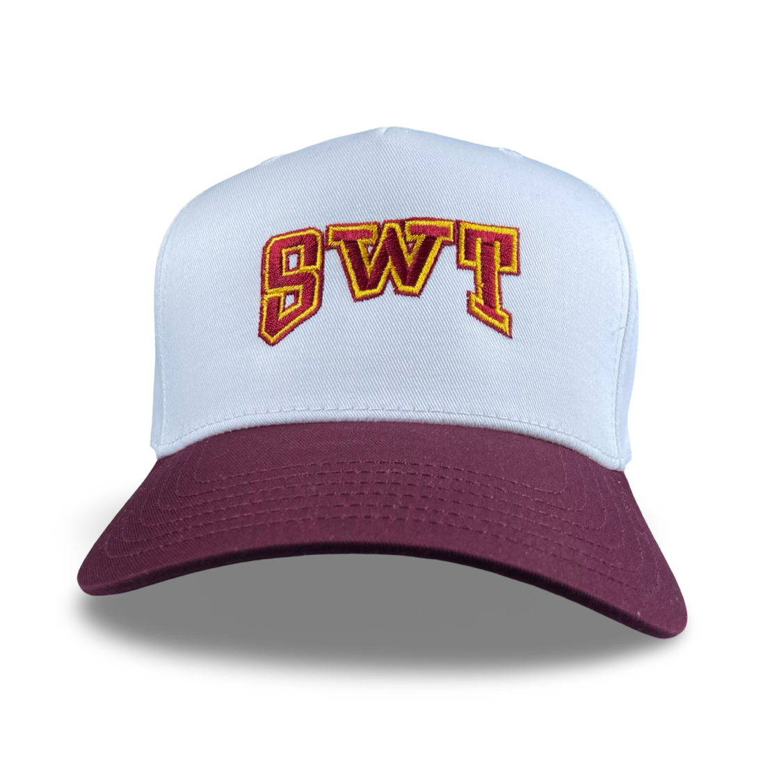 SWT trucker hat in maroon and white with arched Southwest Texas State logo embroidery