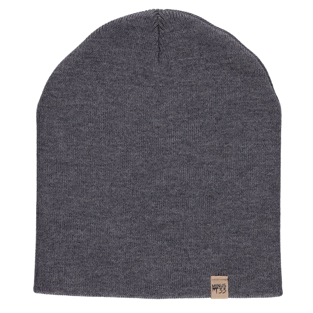 Heavyweight merino wool knit beanie for extreme cold, minimalist design in solid colors