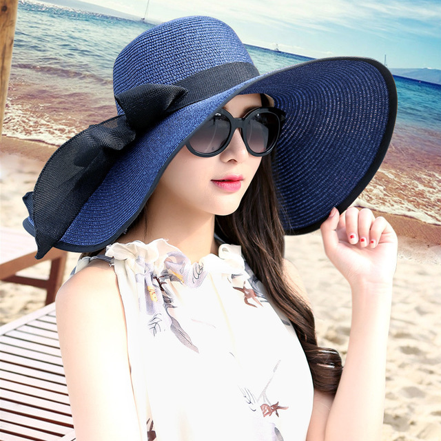 Women’s Wide Brim Summer Straw Hat with Elegant Bowknot Detail