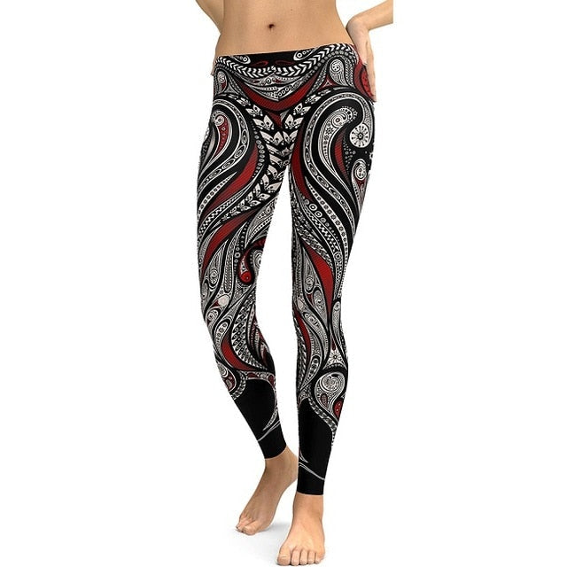 Women's Harajuku style leggings with a striking black, red, and white/grey mandala flower 3D digital print, worn by a model.