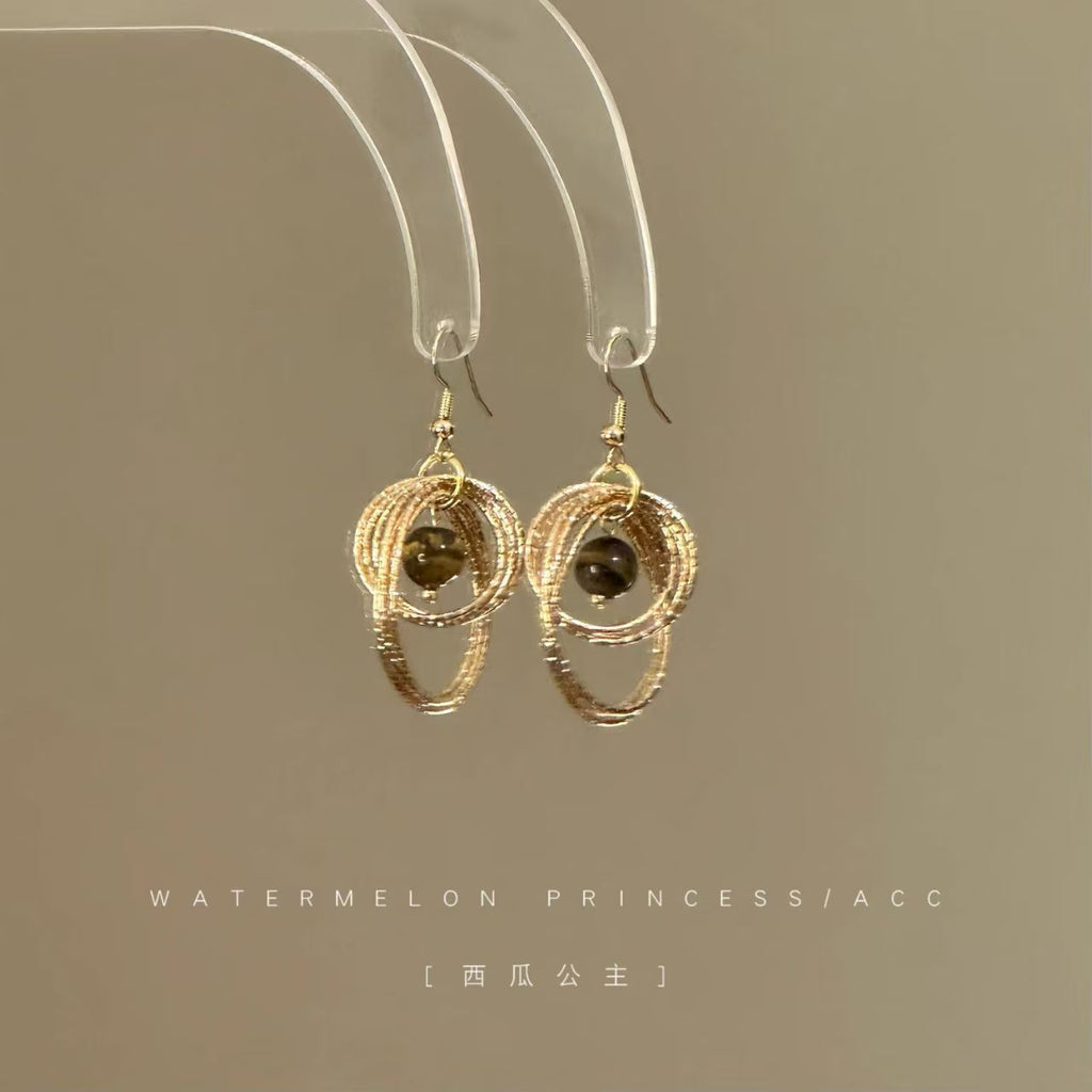 Elegant Tiger's Eye gemstone earrings in gold setting by Vera Lux