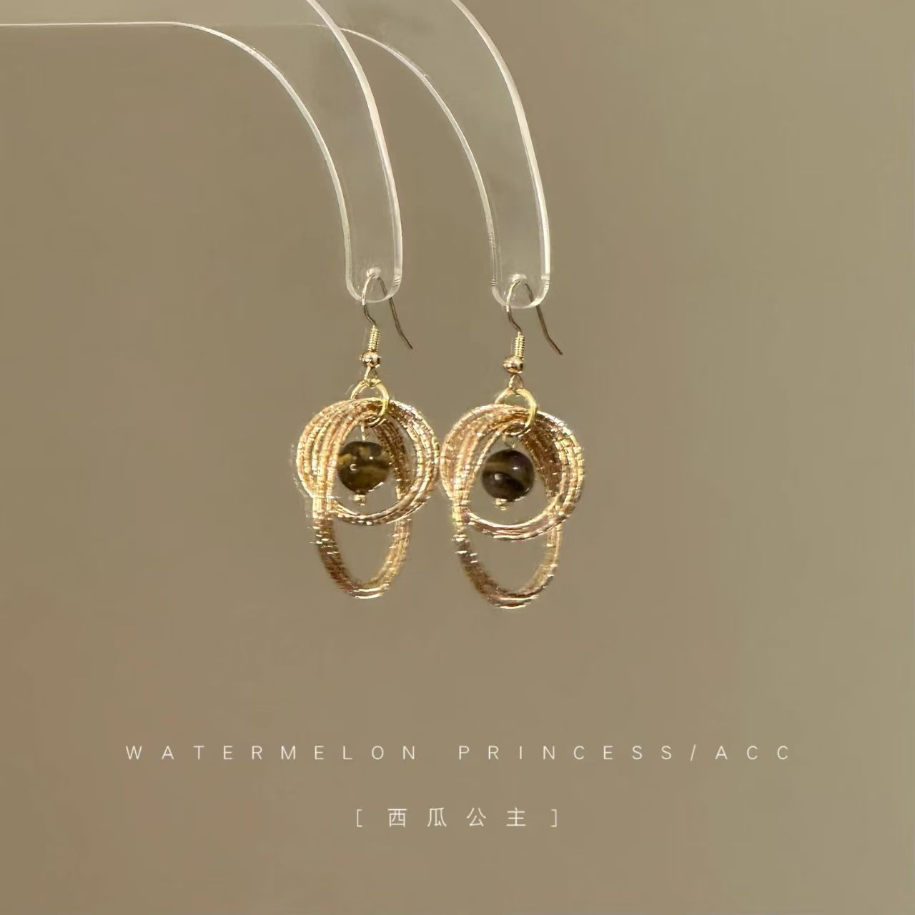 Elegant Tiger's Eye gemstone earrings in gold setting by Vera Lux
