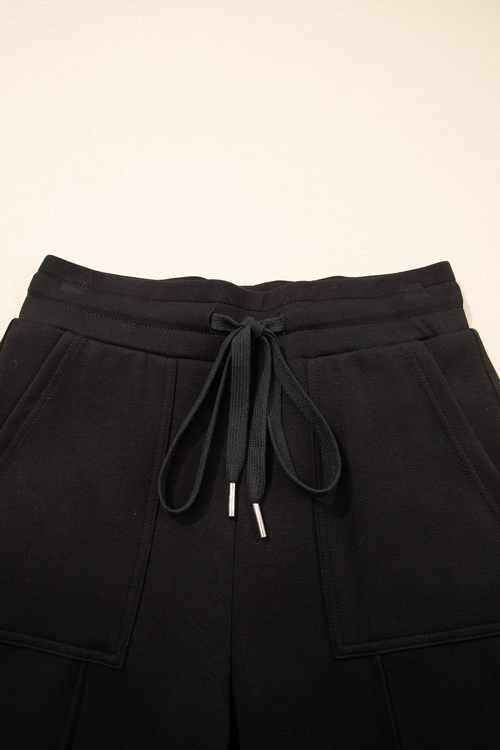 Black Exposed Seam Skinny Drawstring Jogger Pants