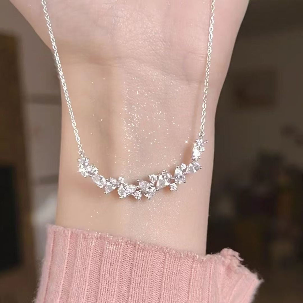 999 Sterling Silver Smile Bar Necklace with CZ Cluster Accent