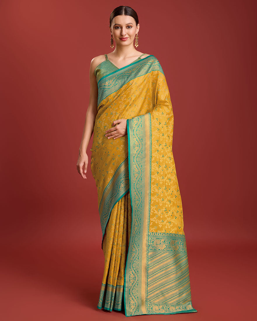 Mustard yellow Banarasi tissue silk saree with intricate golden zari work