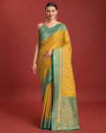 Mustard yellow Banarasi tissue silk saree with intricate golden zari work