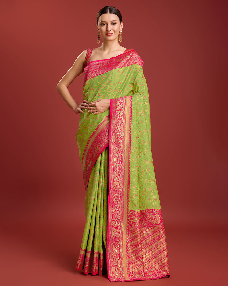 Parrot green Banarasi tissue silk saree with gold zari woven details