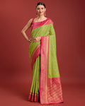 Parrot green Banarasi tissue silk saree with gold zari woven details