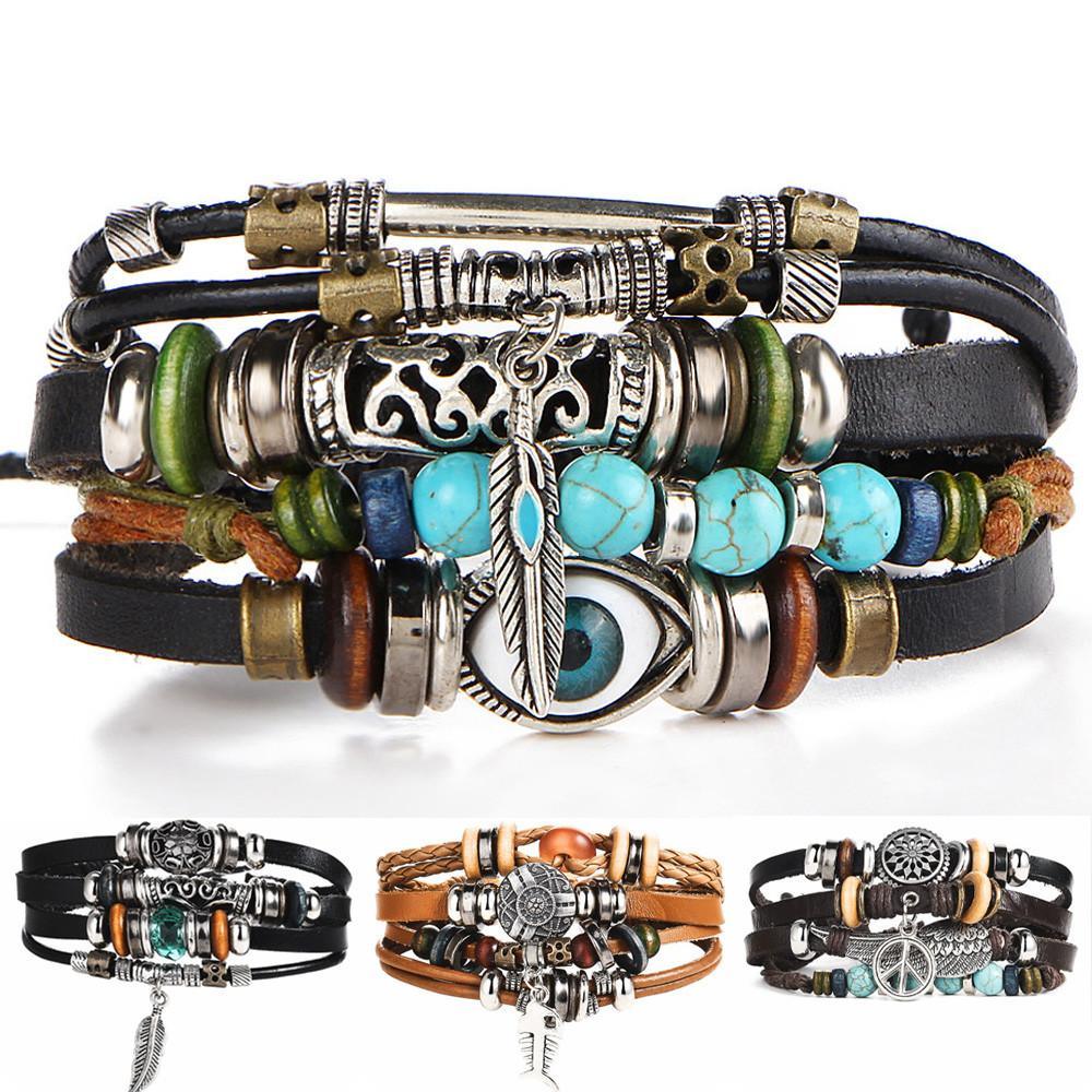 Boho-style multilayer leather wrap bracelet with gemstone beads and fish charm.