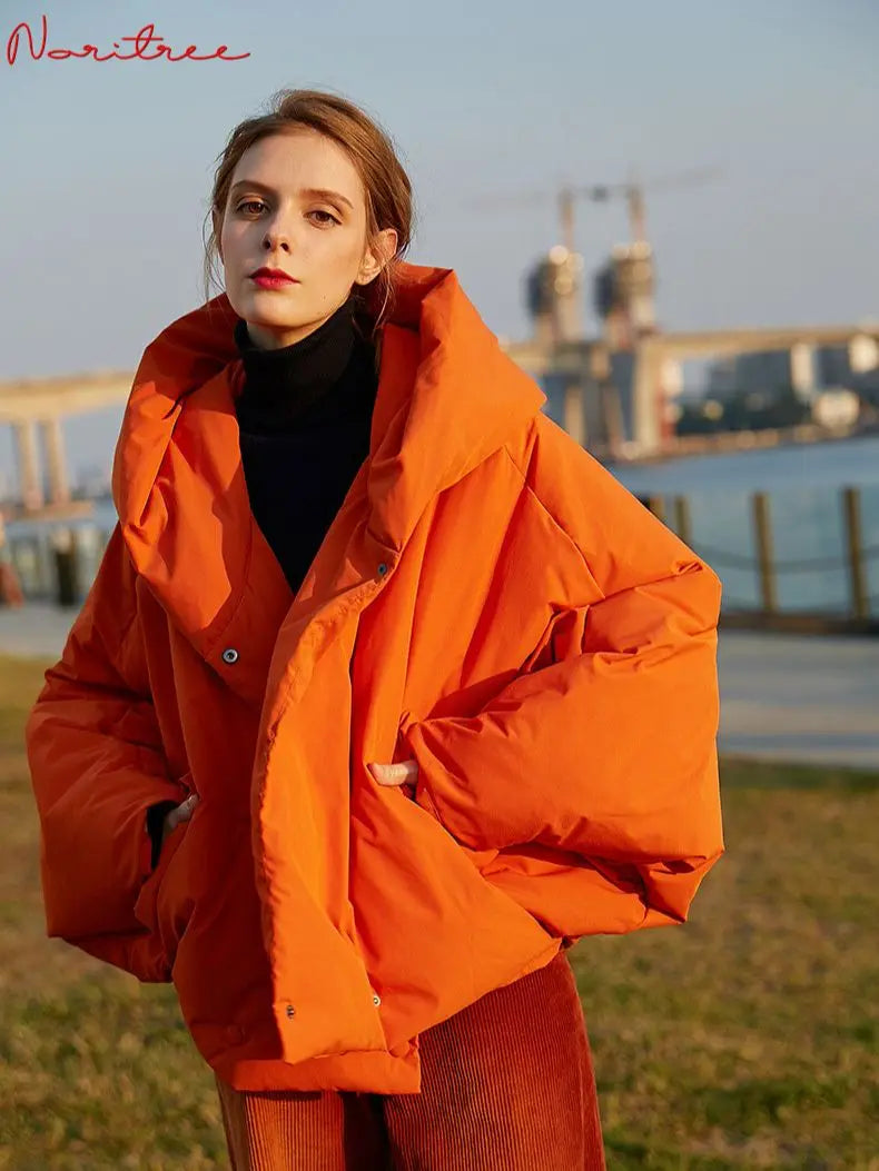 Harajuku Style Women's oversized fluffy down parka in vibrant orange-red, perfect for winter warmth and fashion.