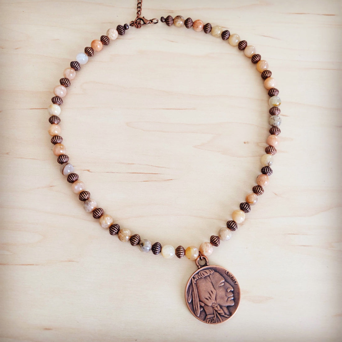 Natural agate stone beaded necklace with a copper-tone Indian head nickel pendant
