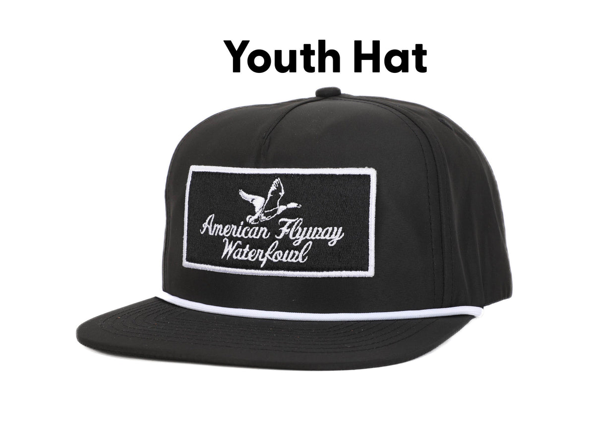 Youth throwback style black hat with white rope detail and a decorative patch.