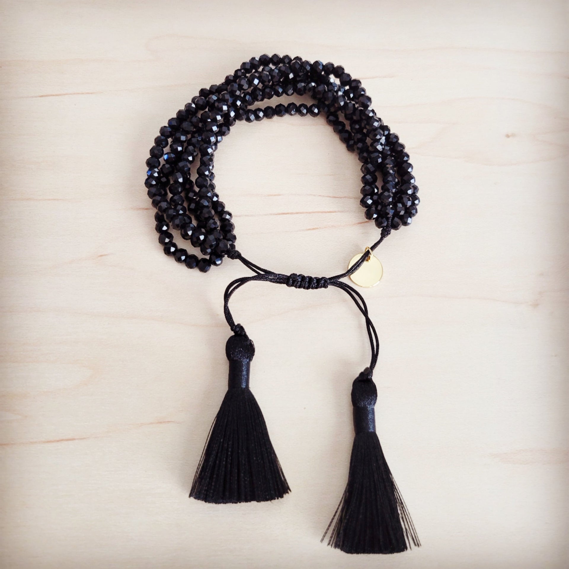 Midnight Multi-Strand Faceted Black Bead Tassel Bracelet - Image 4
