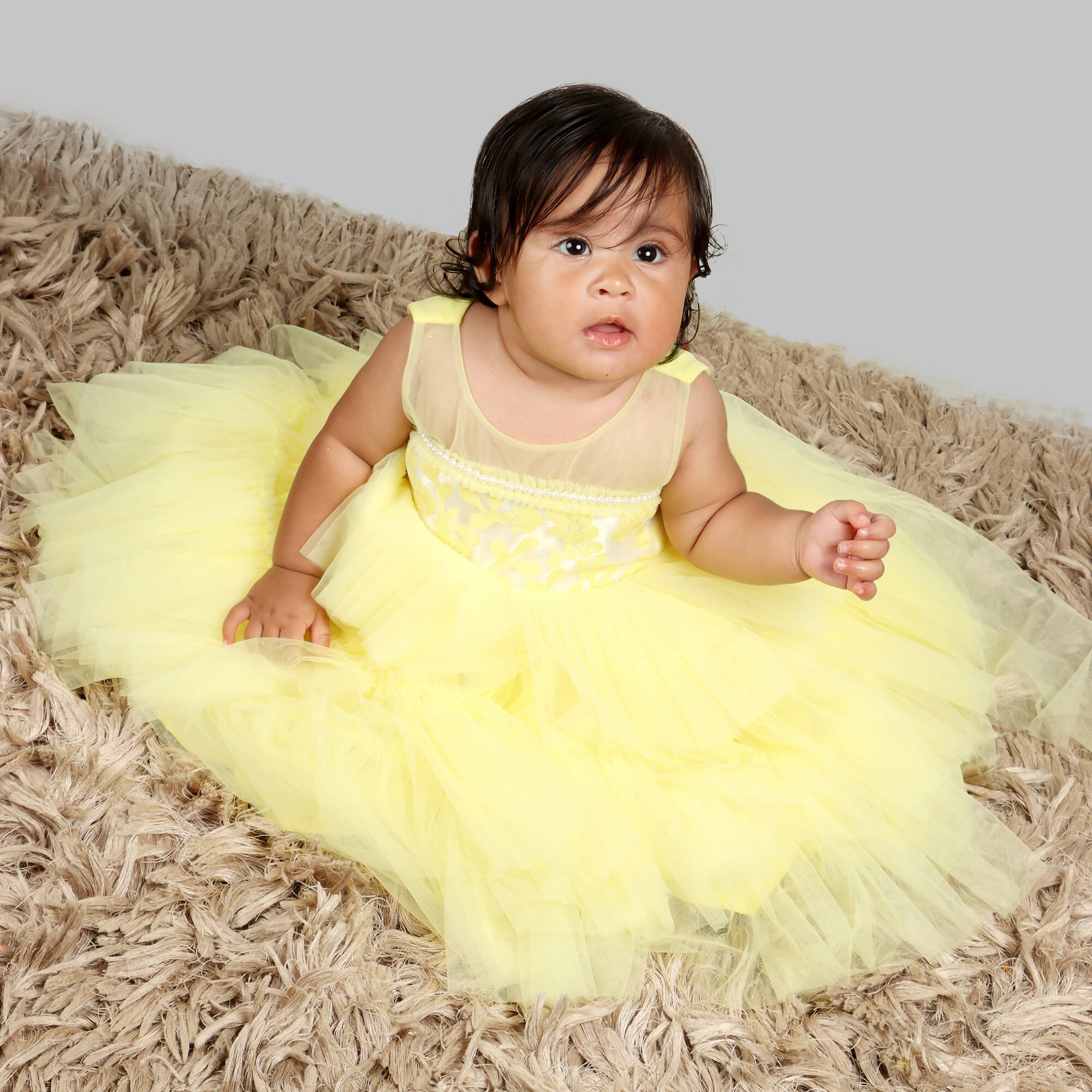 Yellow Girls Formal Gown with Organza Chest and Net Layer Ghera