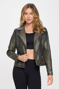 Back and front view of a woman wearing a distressed faux leather moto jacket with silver shoulder studs.