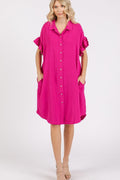 Feminine button-down dress with flounce sleeves and functional side pockets.
