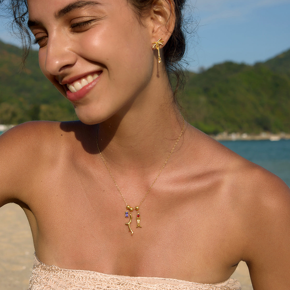 Zircon Fish Pendant Necklace in Gold with Coral Accents