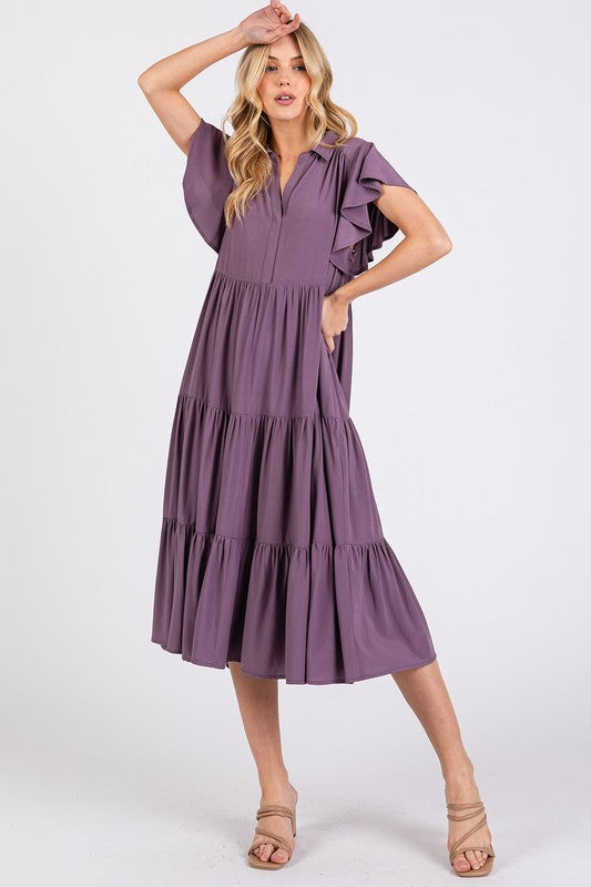 Dusty-purple midi dress with ruffle sleeves, V-neck, and tiered skirt.