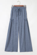 Willow high-waisted knit pants in blue with drawstring elastic waistband and wide leg silhouette