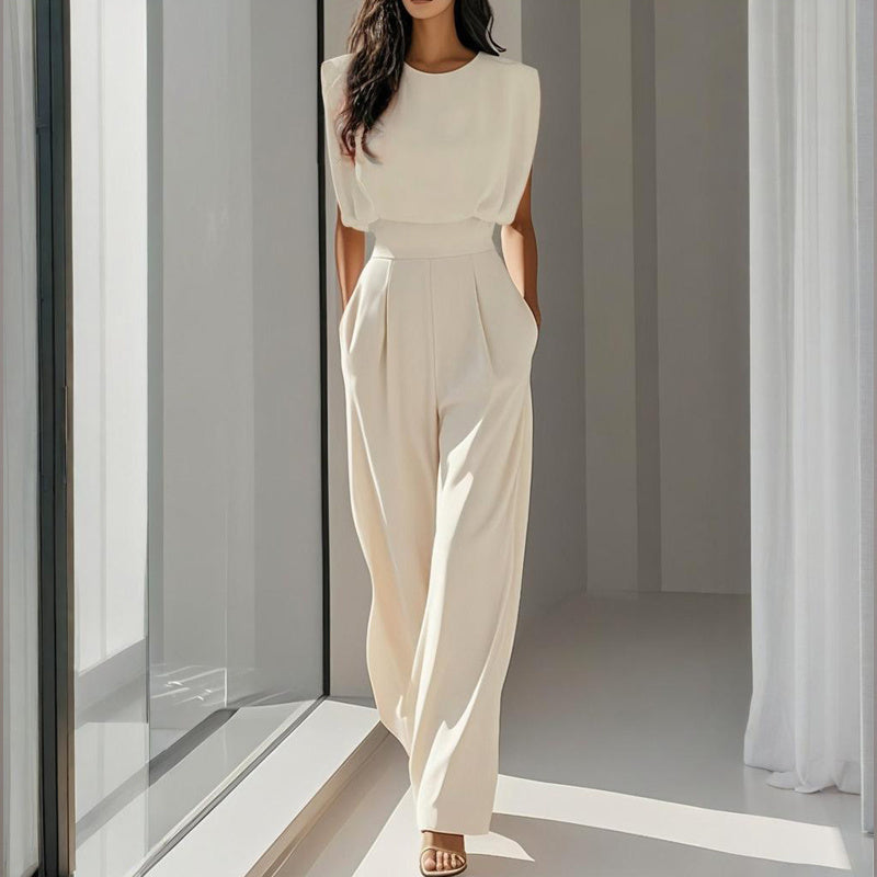 Women wearing a comfortable wide-leg jumpsuit with short sleeves and a waist tie