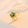 Nephthytis flower rotating ring featuring zircon diamond inlay in vibrant gemstone colors