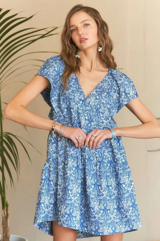 Blue and white floral print mini dress with ruffle sleeves