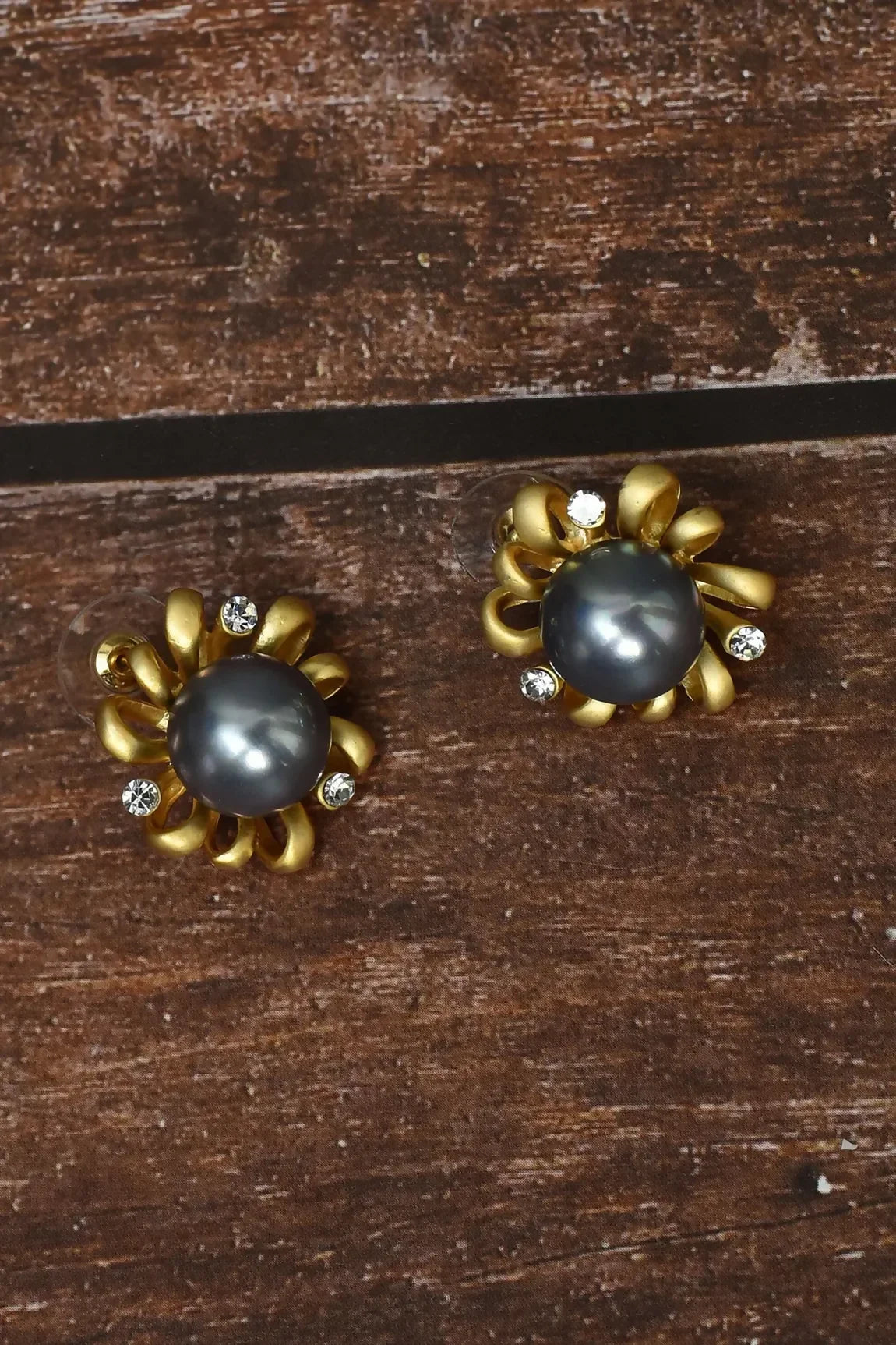 Elegant Golden White AD brass earrings, perfect for party wear.