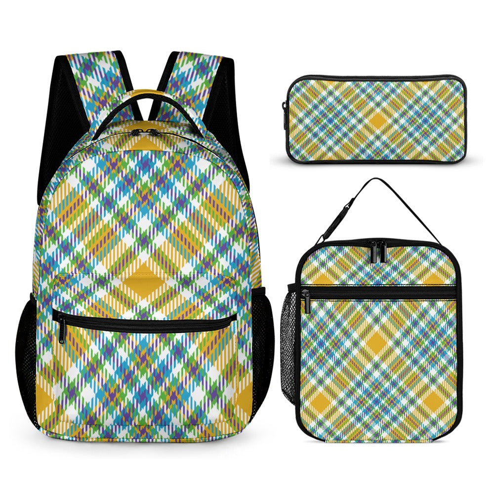 A three-piece backpack set featuring a yellow, blue, green, purple, and white plaid pattern. The set includes a full-sized backpack with front and side pockets, a matching insulated lunch bag, and a pencil case. The backpack has padded shoulder straps and a reinforced bottom.