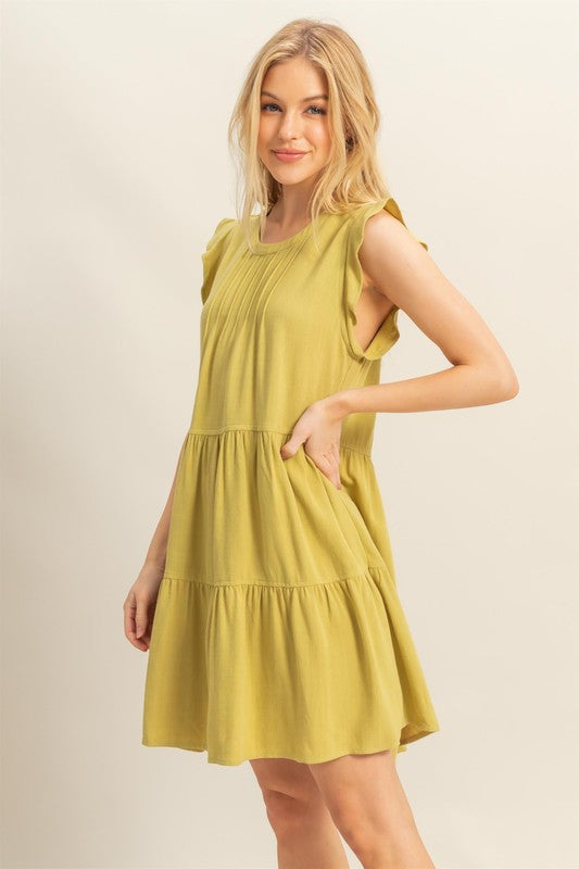 Olive green tiered mini dress with ruffle sleeves and round neck