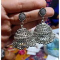 Round silver oxidized jhumka earrings for girls and women, featuring intricate traditional metalwork.