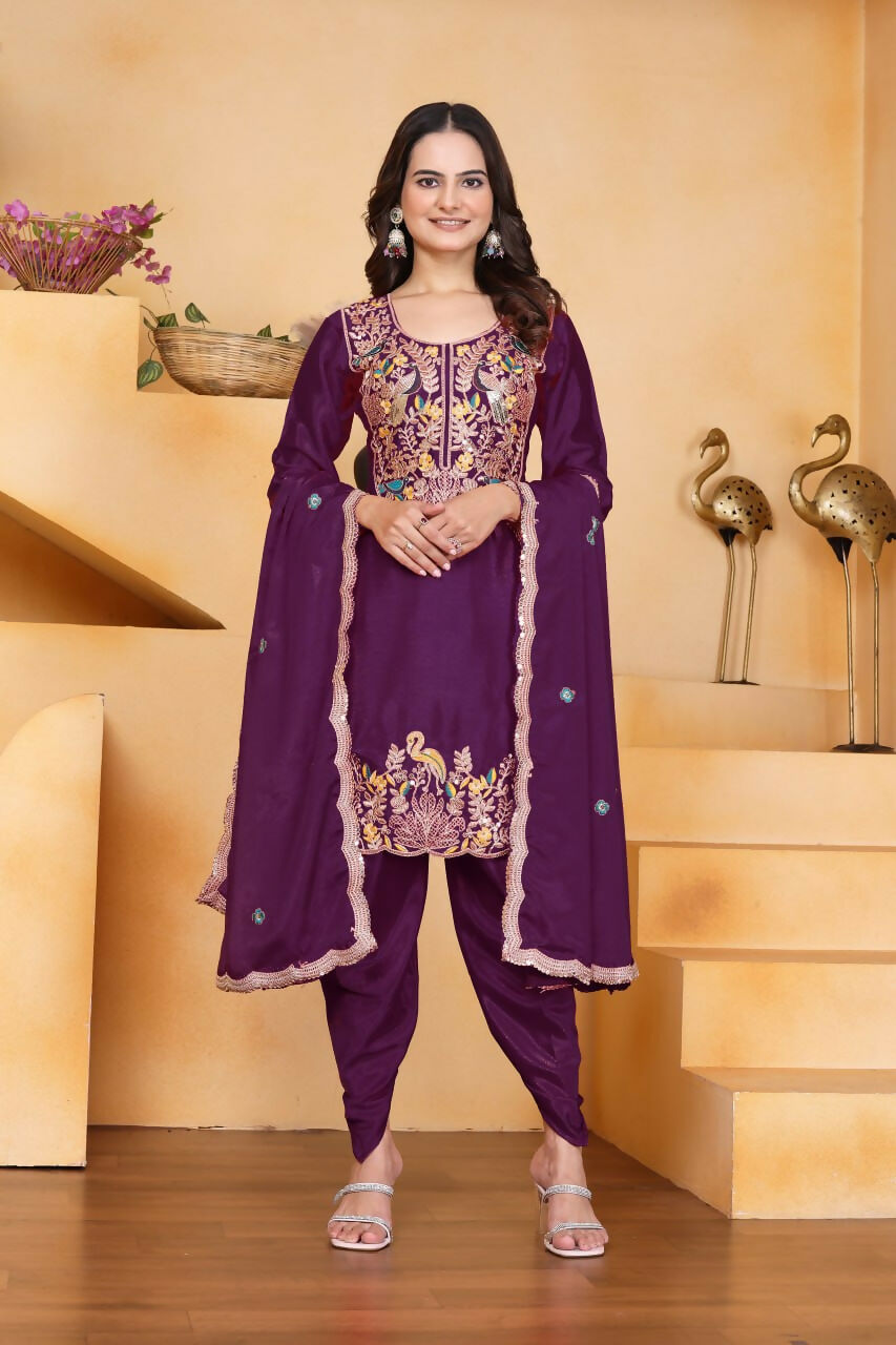 Wine colored silk kurti with matching dhoti pants and intricate embroidery