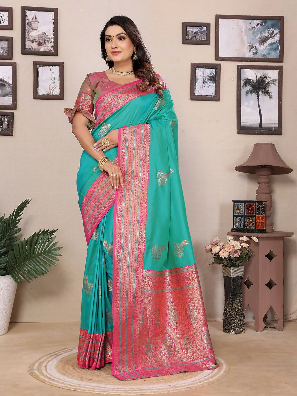 Turquoise Banarasi soft silk saree with traditional small butti pattern.