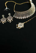 Traditional Rajwadi style heavy golden choker necklace set with white stone accents